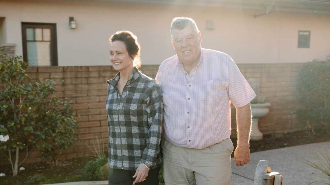 Couple Walking Outside Sunset