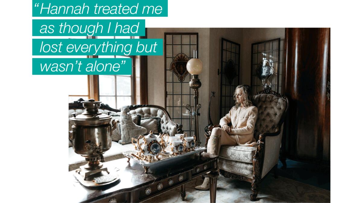 A woman sitting in a living room with ornate furniture, overlaid with text that reads, "Hannah treated me as though I had lost everything but wasn’t alone."