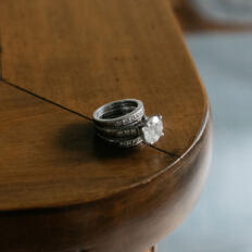 A close up photo of a diamond ring on a table