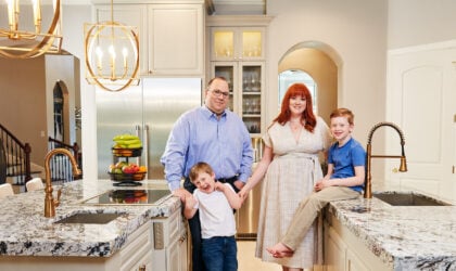 PURE members Christina and Craig Dillard with their children in their kitchen.