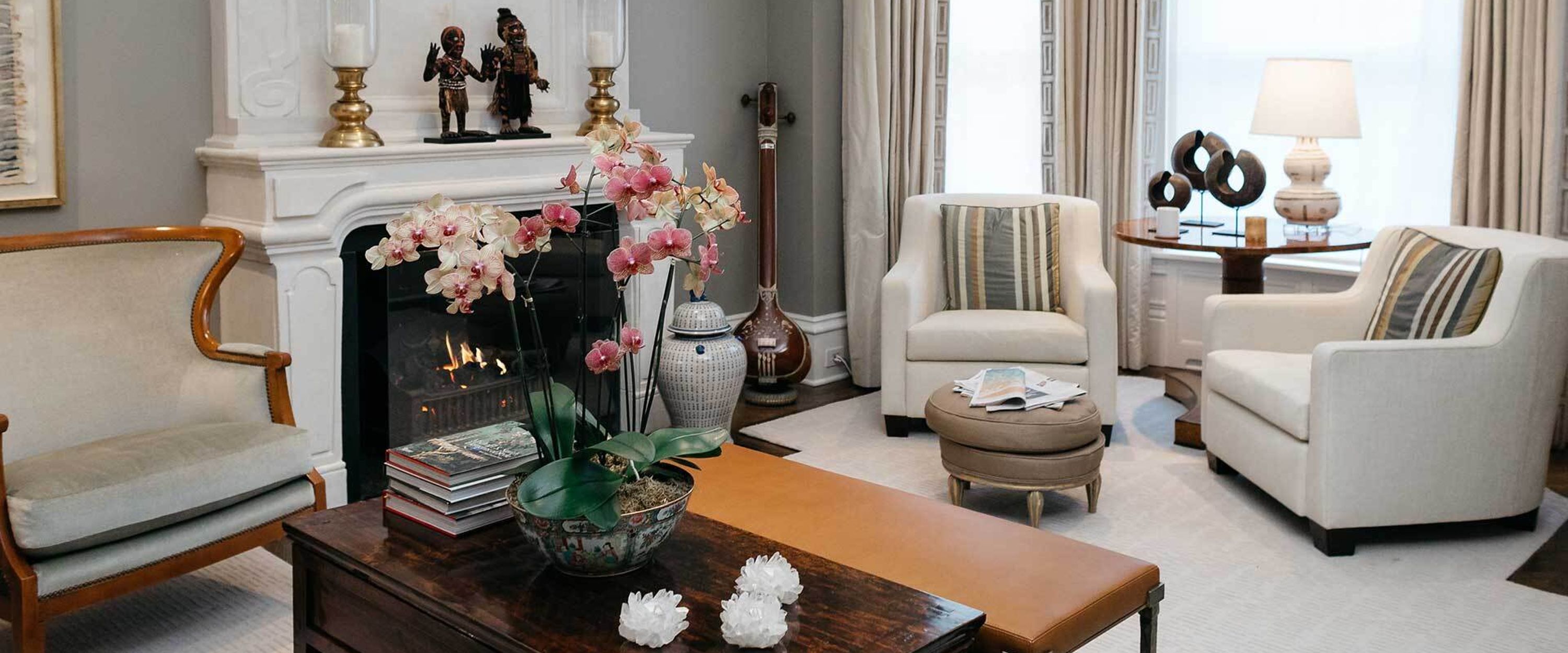 A photo of the living room of a well decorated, high-end apartment.
